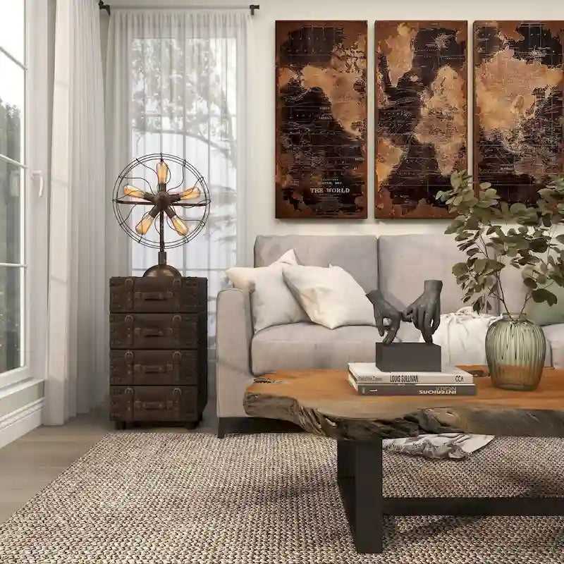 Commode vintage en similicuir noir à 4 tiroirs, ornée de sangles à boucle et de clous dorés - Roche River Decor