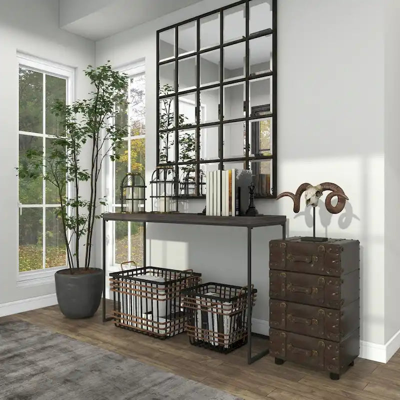 Commode vintage en similicuir noir à 4 tiroirs, ornée de sangles à boucle et de clous dorés - Roche River Decor